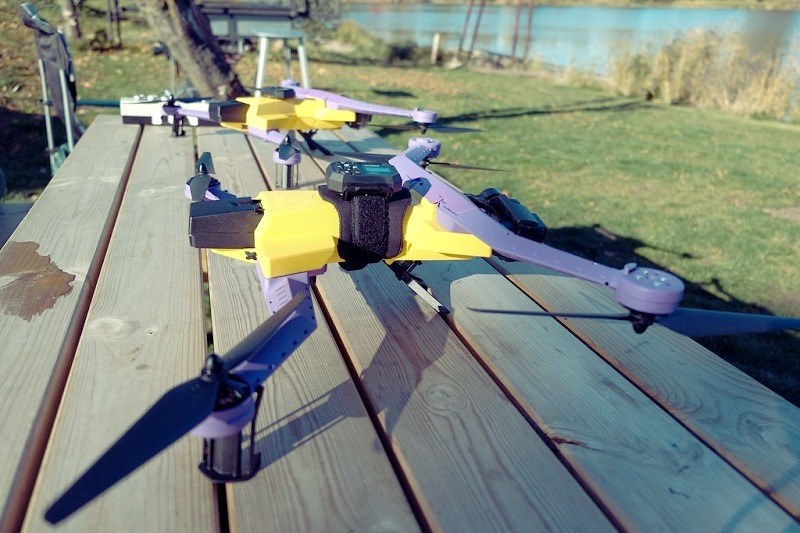 Airdog Auto Follow Drone stands on a park bench